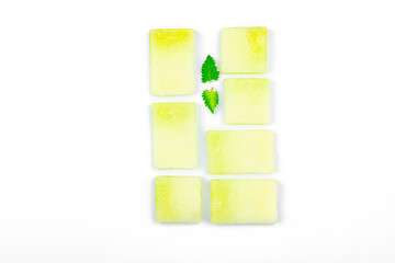 Geometric pattern of fresh melon pieces cut into squares, circles, triangles. Abstract food design