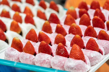 Strawberry Daifuku, or ichigo daifuku is a popular Japanese confection (wagashi) consisting of a whole fresh strawberry covered in a thin layer of sweet bean paste and wrapped in a soft.