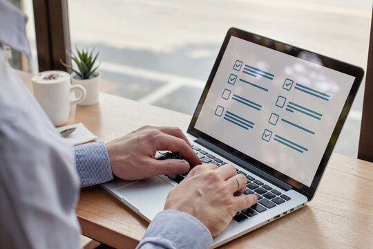 man filling form with checkboxes online, questionnaire survey on the screen