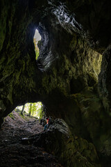 Cave with three windows in the Pokljuka canyon, Slovenia