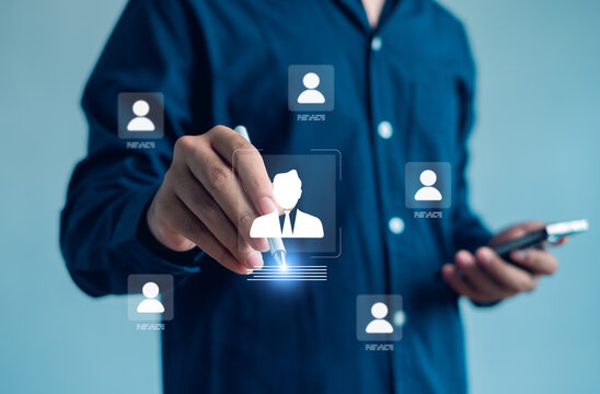 modern business concept image showing person selecting digital profile icon using a stylus, symbolizing HR technology, recruitment, customer management, data systems, professional digital interaction.