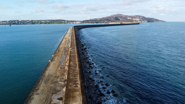 Aerial view of the long curving breakwater at Holyhead