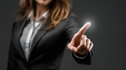 Businesswoman finger pointing touch screen gesture technology interface suit office innovation focus confident energy