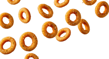Many golden-brown, crispy onion rings and fried crumbs suspended dynamically in mid-air against a pristine transparent seamless studio background, dynamic food advertising