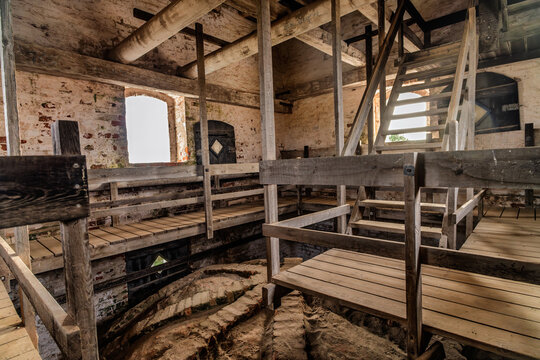 Rustic Old Church Interior with Wooden Walkways, Staircase, Brick Walls, and Atmospheric Dusk Light Texture, Tilsandede Kirke, Skagen, Denmark