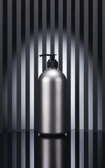 Silver cylindrical bottle placed against black and white vertical lines in an indoor setting, highlighted by dramatic lighting for a modern, stylish presentation.