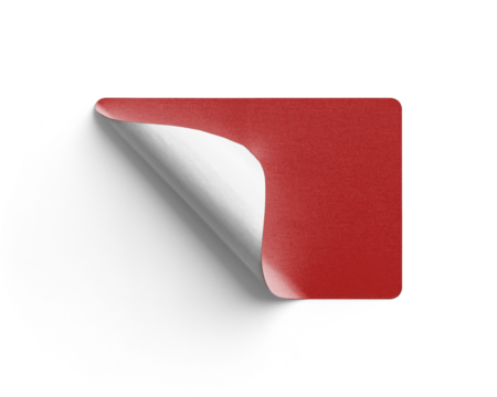 Red Sticker Curling from Bottom Left