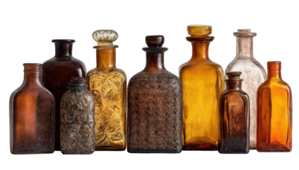Collection of antique, ornate glass bottles of varying colors