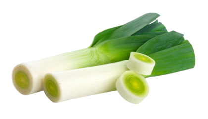 Close-up studio shot of fresh leeks; two whole and two sliced pieces on black