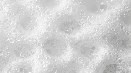 Abstract white soapy foam texture with bubbles. Background concept for shampoo, face cleanser, shaving cream or hygiene product.
