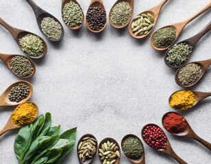 Assortment of Spices in Wooden Spoons on Gray Background for Culinary and Cooking, Food Preparation, Herbs and Seasonings.