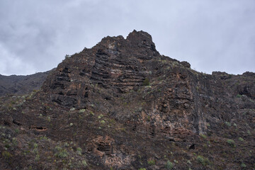 Volcanic peak above canyon walls