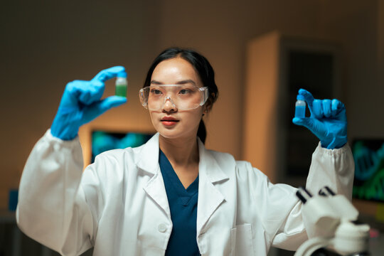 Female scientist researching new formulas in laboratory