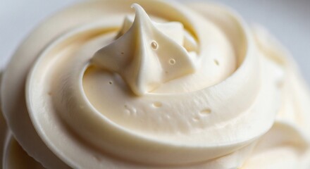Delicious and smooth vanilla buttercream frosting with beautiful swirls, ready to top a cupcake or cake
