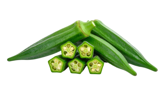 Close-up of sliced and whole green pods, showing vibrant colors against black