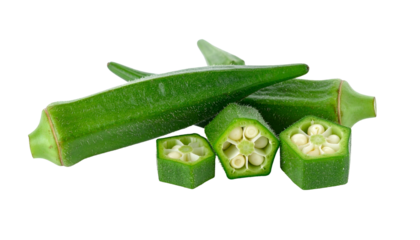 Close-up of sliced and whole green okra with a black background, healthy food