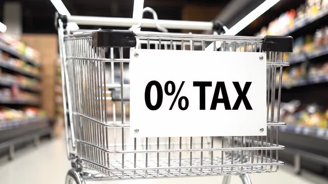 Unoccupied metal shopping cart glides down the grocery store aisle. A white sign attached to the cart declares a tax free shopping experience with 0 percent tax