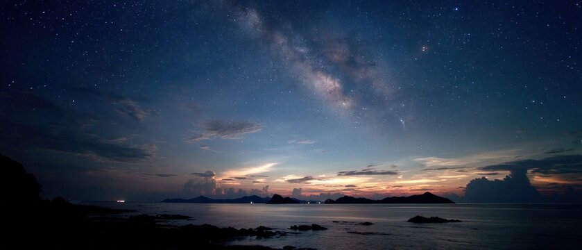 Starry sky and ocean at dusk