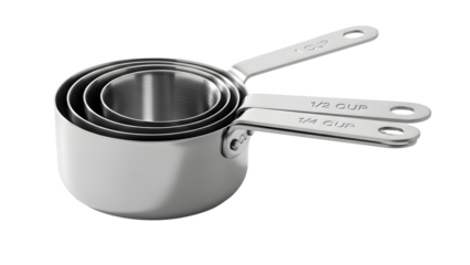 Set of four stainless steel measuring cups with handles on a White background
