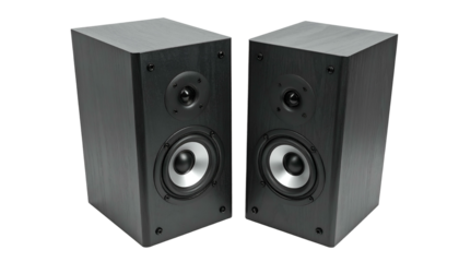 Pair of dark, modern rectangular loudspeakers, angled slightly, isolated on black background