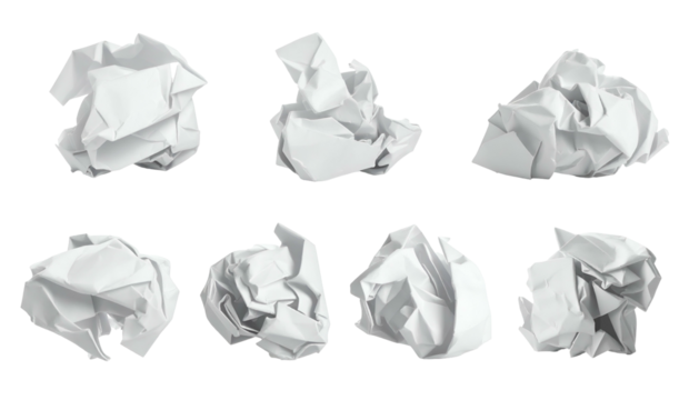 Seven white, crumpled paper balls on a black background, representing failure, ideas, or waste