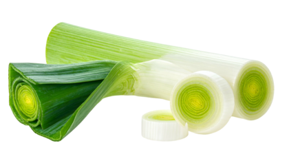 Close-up of sliced and whole sections of a fresh, green, and white allium vegetable