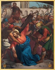 Selbstklebende Fototapeten Jesus Christus Luzern - The painting Simon of Cyrene helps Jesus carry the cross as part of Cross way stations in the church Franziskanerkirche from 19. cent.  © Renáta Sedmáková