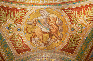 Madrid - Mosaic of lion as symbol of Saint Mark the Evangelist in Iglesia de San Manuel y San Benito by architect Fernando Arbos from 19. cent.