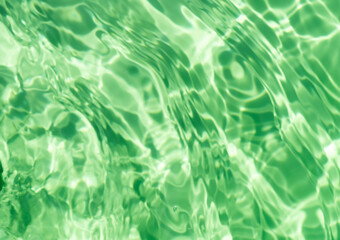 Close-up of the clear mint green water surface