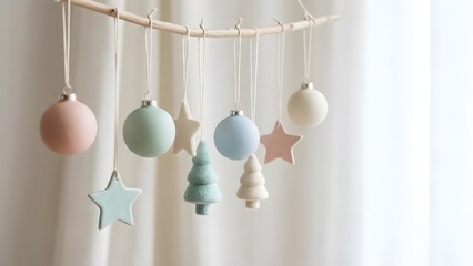 Minimal pastel christmas ornaments on a soft background