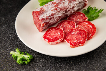 Dry sausage slice pork less fat jamon cured meat natural product tasty snack fresh delicious gourmet food background on the table rustic top view copy space