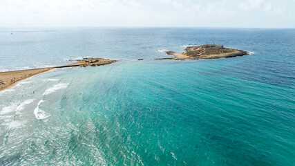 Aerial view of the Isola delle Correnti. It is a small island in Sicily, Italy, located in the...
