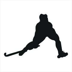 Silhouette of a hockey player in action isolated on white background