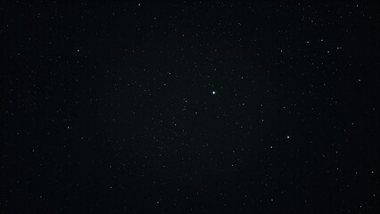 Fototapeta premium Starry night sky with numerous stars scattered across the dark space.