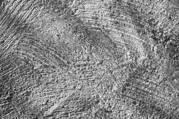 gray background, in the photo the texture of a concrete wall with various lines and strokes