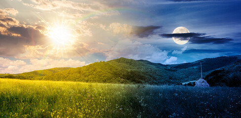 mountain landscape with haystack on the field. day and night time change concept. countryside scenery of Carpathians on summer solstice under the sky with sun and moon. duality and transition template