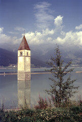 Resia, Bolzano province, Italy: tower in the lake