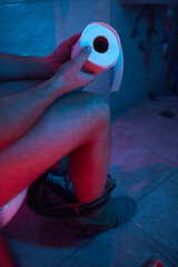 Man with urge to go to the toilet at home.