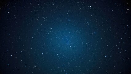 Starry night sky with numerous stars and deep blue background. The cosmos and space scene. Astronomy and celestial objects. The depiction of the universe at night.