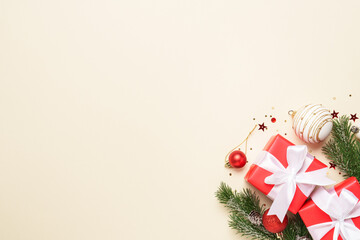 Christmas present, balls and fir tree branches.