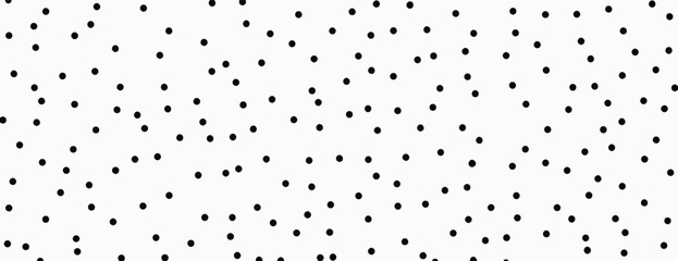 Obraz premium Padrão abstrato de pontos pretos aleatórios sobre fundo branco, vetor minimalista para design gráfico.