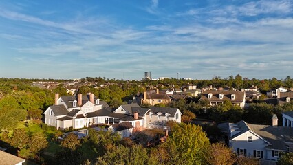 Aerial view of large mansion houses with swimming pool,  in affluent neighborhood  by Woodlands lake, Houston, Texas, expensive suburban homes surrounding by lush green trees, USA