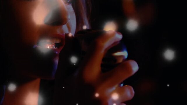 Singer moving in after hand moving, holding vintage mic and singing for music while bokeh drifting