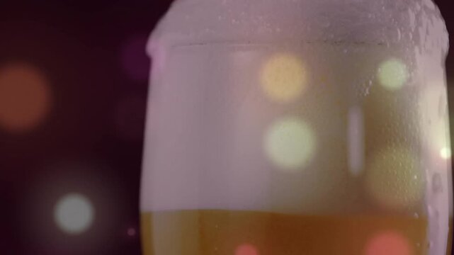 Glass rising revealing chilled pint foam, condensation glinting and bokeh drifting, showing detail
