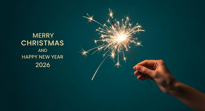 A hand holding a sparkler, shining bright against a teal background with holiday greetings, representing festive celebration and cheerful occasion - Powered by Adobe