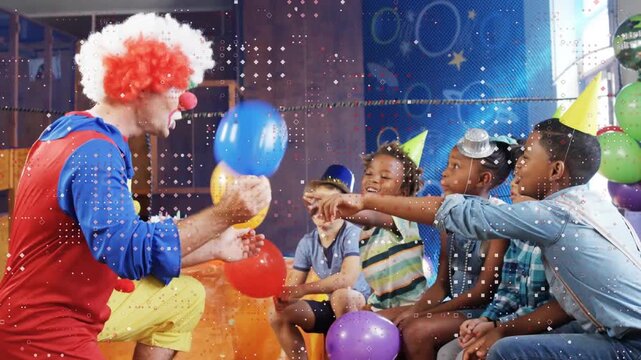 Clown kneeling left offering blue balloon kids reaching and holding balloons with party confetti