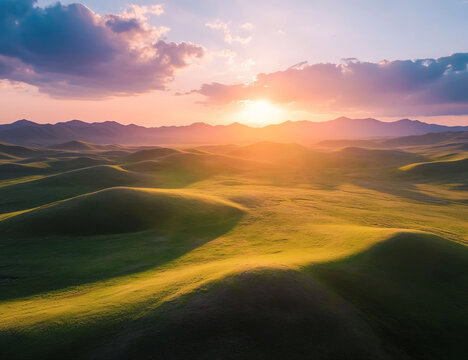 Golden sunset over rolling hills and dramatic clouds