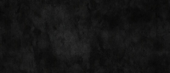 Black asphalt textured background ideal for banners, providing a seamless design space for text or graphics with a strong aesthetic appeal