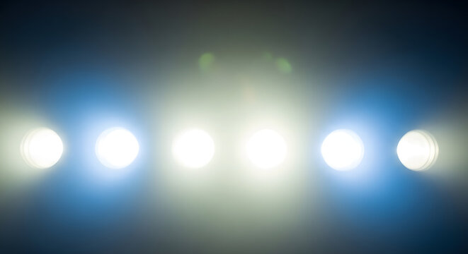 Abstract background with glowing orbs and soft blue hues, perfect for modern designs