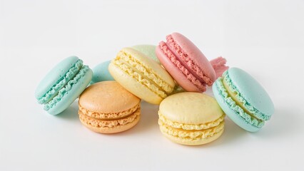 Fototapeta premium Colorful macarons arranged together with pastel shades and smooth texture.